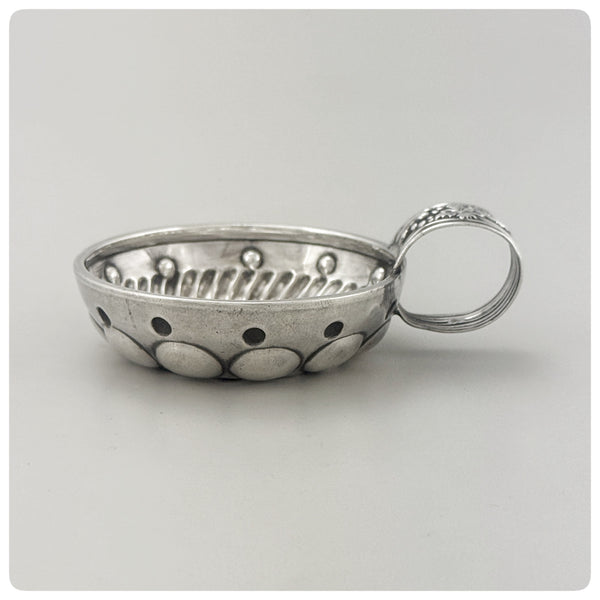 First Standard (950/1000) Solid Silver Wine Taster / Tastevin with Embossed Strap Handle, Paris, Circa 1878