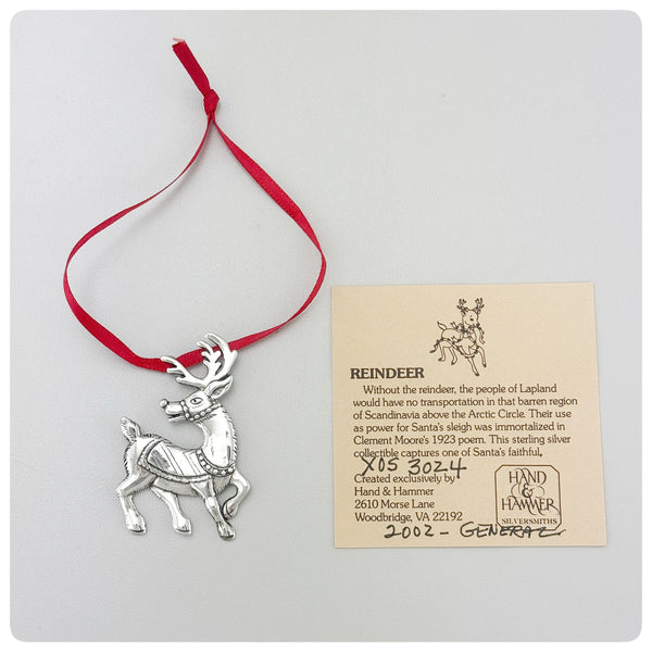 Ornament and paper, American Sterling Silver Handwrought Ornament, Reindeer, Hand & Hammer, Woodbridge, VA, Circa 2002 - The Silver Vault of Charleston