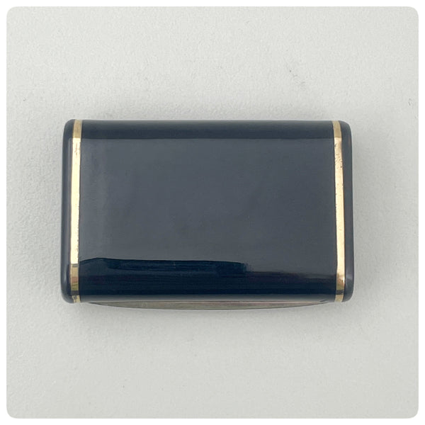 Vermeil, Silver, Black Enamel  and Ruby Pill Box, Van Cleef & Arpels, Paris, Circa 1930