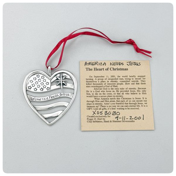 Ornament and paper, American Sterling Silver Handwrought Ornament, The Heart of Christmas, Hand & Hammer, Woodbridge, VA, 2001 - The Silver Vault of Charleston