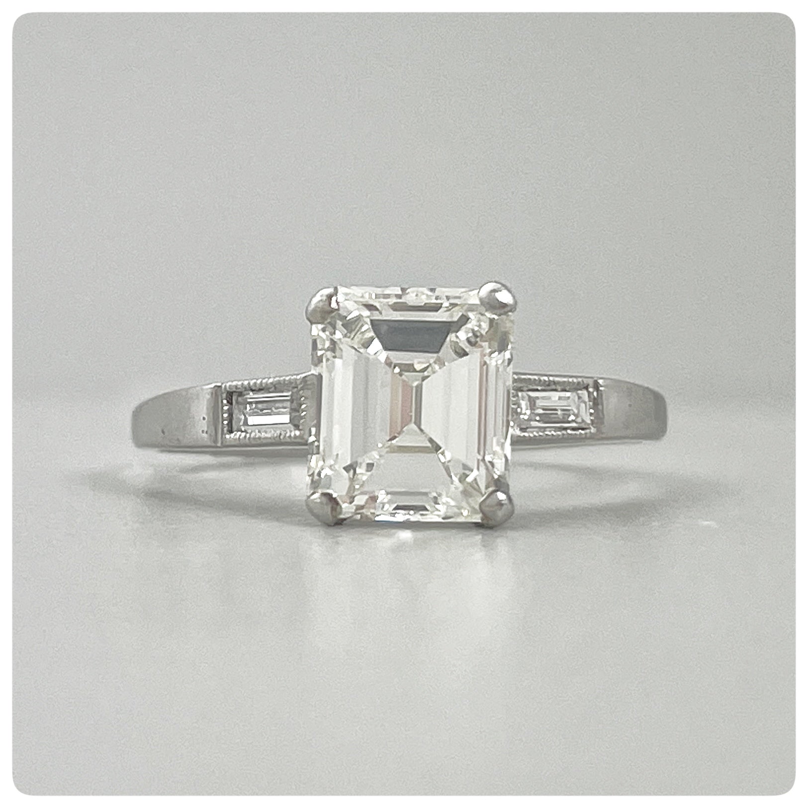 Platinum and Emerald-Cut Diamond Ring with Baguettes, Twentieth Century
