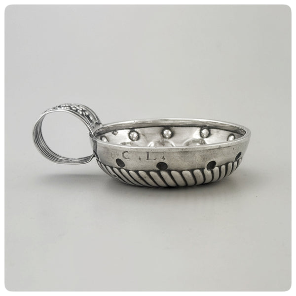 First Standard (950/1000) Solid Silver Wine Taster / Tastevin with Embossed Strap Handle, Paris, Circa 1878