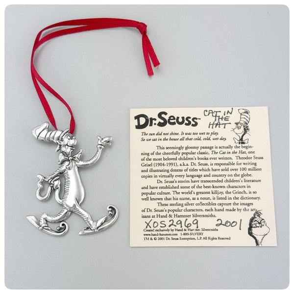 Ornament and paper, American Sterling Silver Handwrought Ornament, Dr. Seuss's Cat in the Hat, Hand & Hammer, Woodbridge, VA, 2001 - The Silver Vault of Charleston