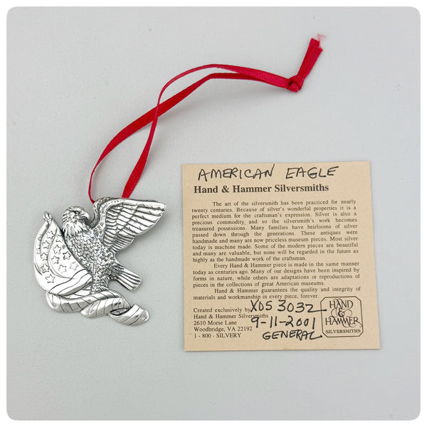 Ornament and paper, American Sterling Silver Ornament, American Eagle, Hand & Hammer, Woodbridge, VA, 2001 - The Silver Vault of Charleston