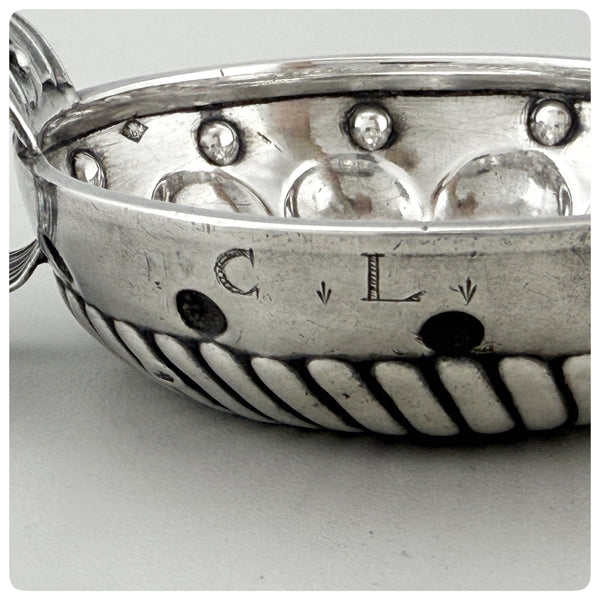 First Standard (950/1000) Solid Silver Wine Taster / Tastevin with Embossed Strap Handle, Paris, Circa 1878