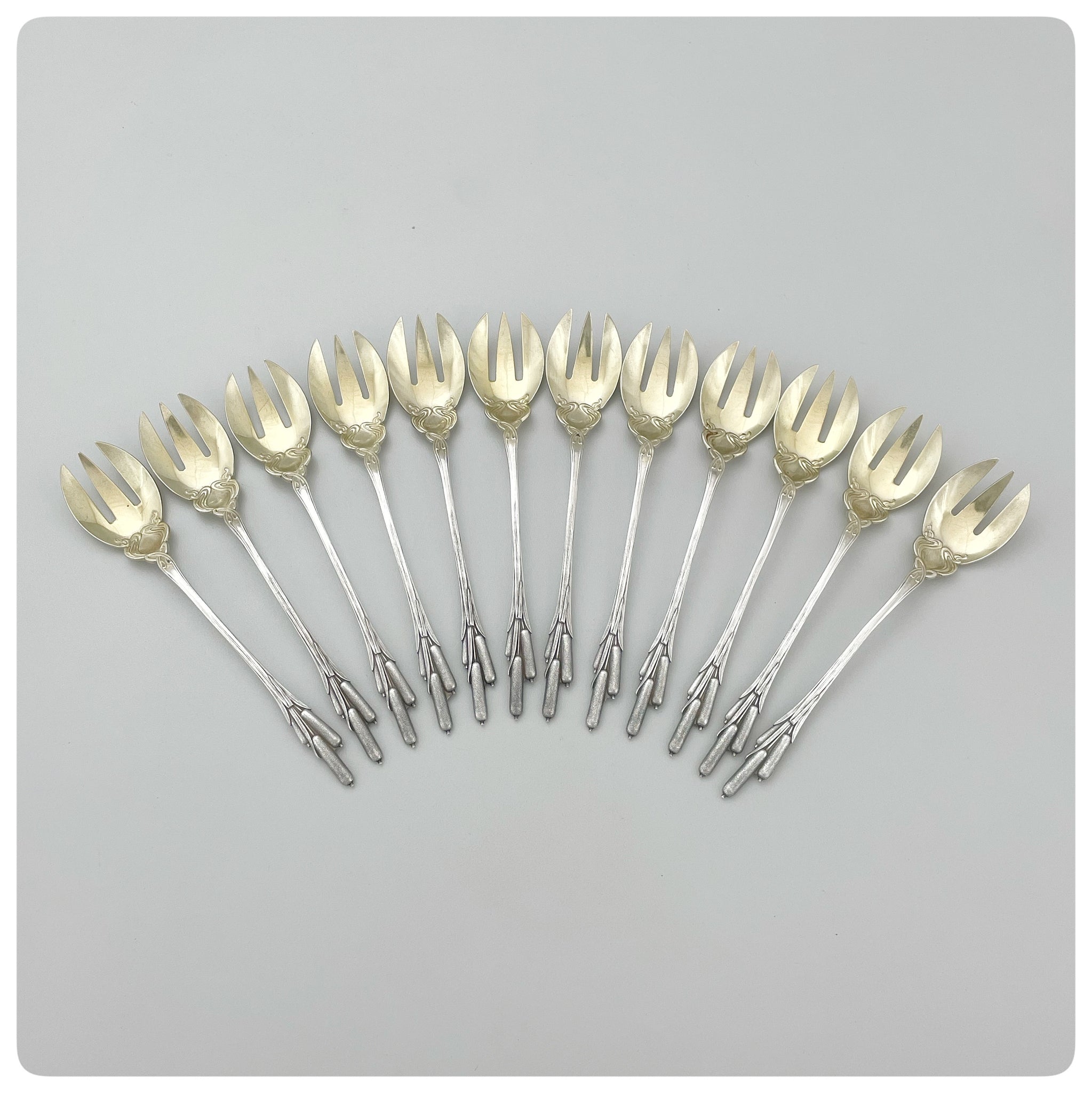 Set of Twelve Sterling Silver and Vermeil Ice Cream Forks in "Cat Tails", William B. Durgin Company, Concord, NH, Patented 1898