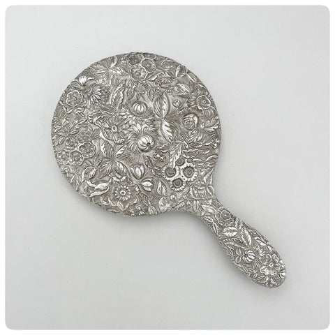 American Sterling Silver and Beveled Glass Hand Mirror in "Repousse", S. Kirk and Son Company, Baltimore, MD, 1903-1924