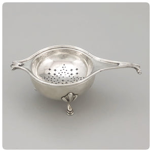English Sterling Silver Tea Strainer and Stand, Lionel Alfred Crichton, London, 1927-1928